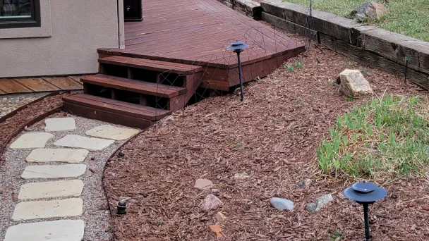 Photo of backyard path to stairs. 
