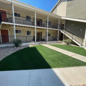 Photo of an apartment front. 